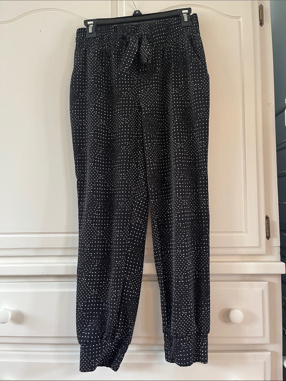 Polka dot patterns dress pants with cuffed bottoms